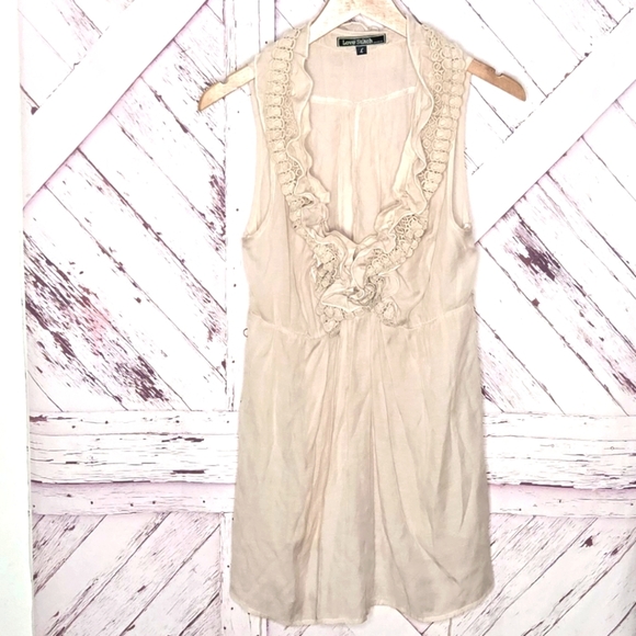 Love Stitch Embroidered Ruffled Sleeveless Top - Picture 1 of 4